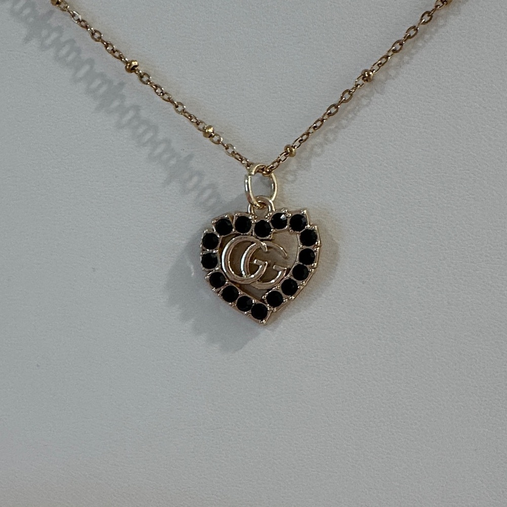Gucci Gold Necklace with Black Heart Crystals